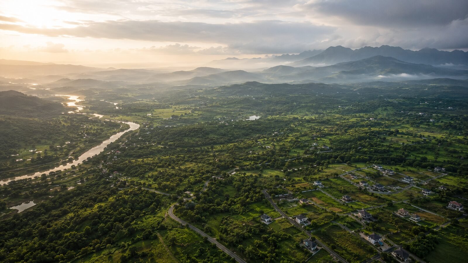Aerial view of the Ulhas river valley, farmland and forested hills that define Karjat's geography and natural setting
